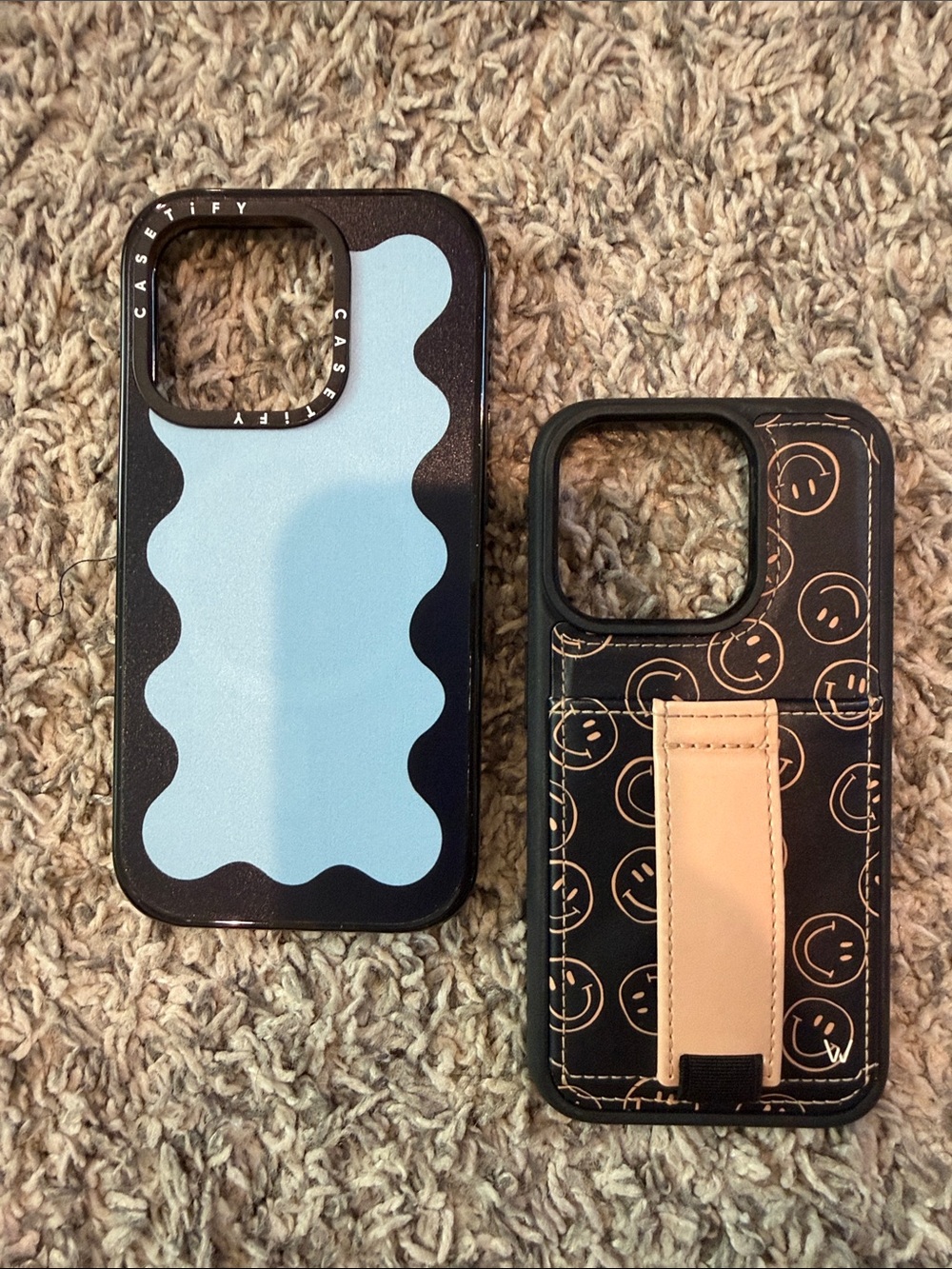 Casetify Blue Wave & Walli Black Smiley Strap iPhone 15 Pro Cases